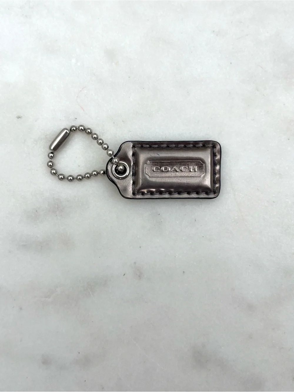 COACH Shiny Patent Leather Hang Tag, Gray Silver